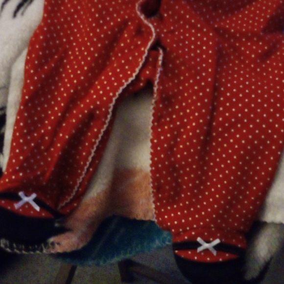 A baby a sleeper it has red with white spots littl - Picture 2 of 4